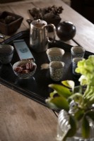 Coffee tray on wooden table - detail