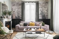 Pink sofa in modern living room with period details 