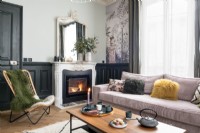 Lit fireplace in classic style living room 