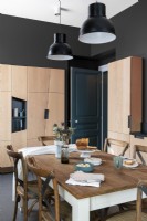 Modern black and wooden kitchen-diner