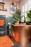 Freestanding copper covered bathtub