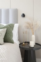 Close up of modern bed and bedside table