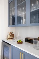 Details of kitchen worktop in blue and white.