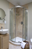 Modern tiled quadrant shower fitted in to a corner