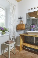 Country style bathroom with window