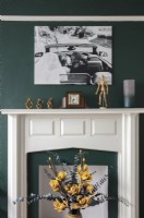 Large wedding photograph above fireplace - detail