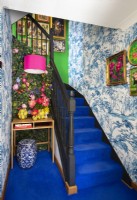 Colourful eclectic hallway and staircase