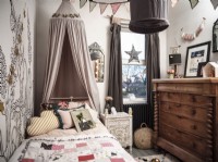 Children's bedroom with bedstead and canopy