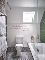 Small green and white bathroom with tiles
