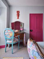 Coastal themed chair and dressing table with pink door