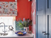 Coastal inspired vase, bowl and crab ornament on kitchen counter in colourful kitchen