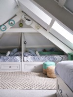 Airy loft bedroom with coastal detail and neutral tones