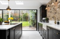 Classic modern kitchen with garden beyond