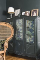 Painted antique dresser in modern living room