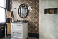 Sink unit in modern bathroom with patterned wallpaper