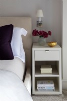 Close up details of bed and bedside table.