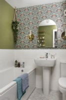 Patterned wallpaper in modern bathroom