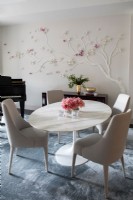 Modern dining room with dogwood tree wall decoration
