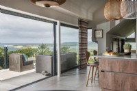 Coastal views from contemporary kitchen and terrace