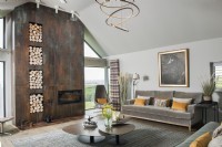 Contemporary living room with corten steel fireplace feature wall