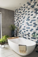 Tiled wall in modern bathroom
