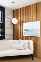 Modern seating area with slatted wall 