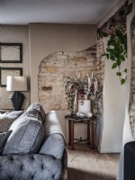 Close up of exposed brickwork in neutral living room