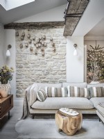 Exposed brickwork wall in neutral seating area