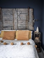 Retro bedroom with wooden door headboard