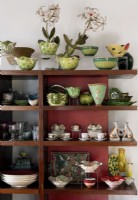 Shelves displaying ceramic collection