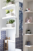 Detail of shelves and mirror. Contemporary blue and white family Bathroom