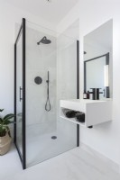 Striking modern black and white bathroom.