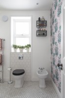 Classic family bathroom with feature wallpaper
