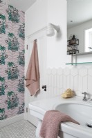 Classic family bathroom with feature wallpaper