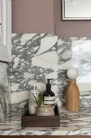 Close up of accessories on marble sink