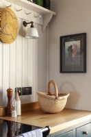 Close up of artwork and light in shaker style kitchen