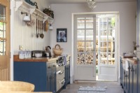 Shaker style country kitchen with painted blue cabinets