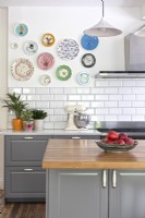 Grey shaker kitchen with plate collection display