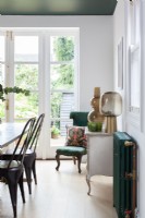 Bright green and white dining room