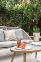 Contemporary patio furniture with summer drinks