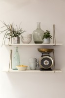 Kitchen shelf with weighing scales and crockery