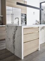 Marble kitchen unit with wooden drawers