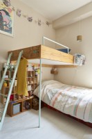 Bunk beds with wall mounted storage . 