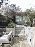 Outdoor space featuring a modern extension