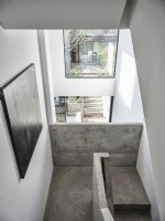 Concrete stairway with view through to garden
