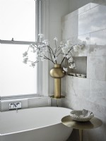 Close up of white flowers in bathroom