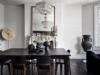 Stylish dining room with black furniture