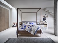 Four poster bed in open plan room