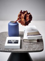 Side table with books an flower