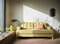 Yellow sofa with light on it